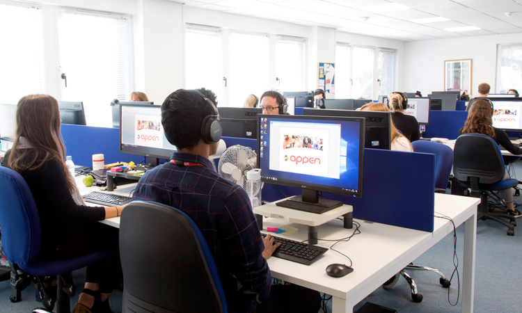 Workers in the Appen Exeter office